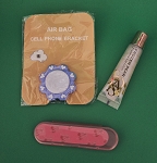 BUNDLE VICTORIA'S SECRET LIP GLOSS, PHONE BRACKET AND NAIL FILE