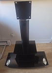 BLACK STAND TV ADJUSTABLE PRE OWNED ***