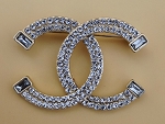 LARGE CC. CRYSTAL GOLD TONE MODERN BROOCH 